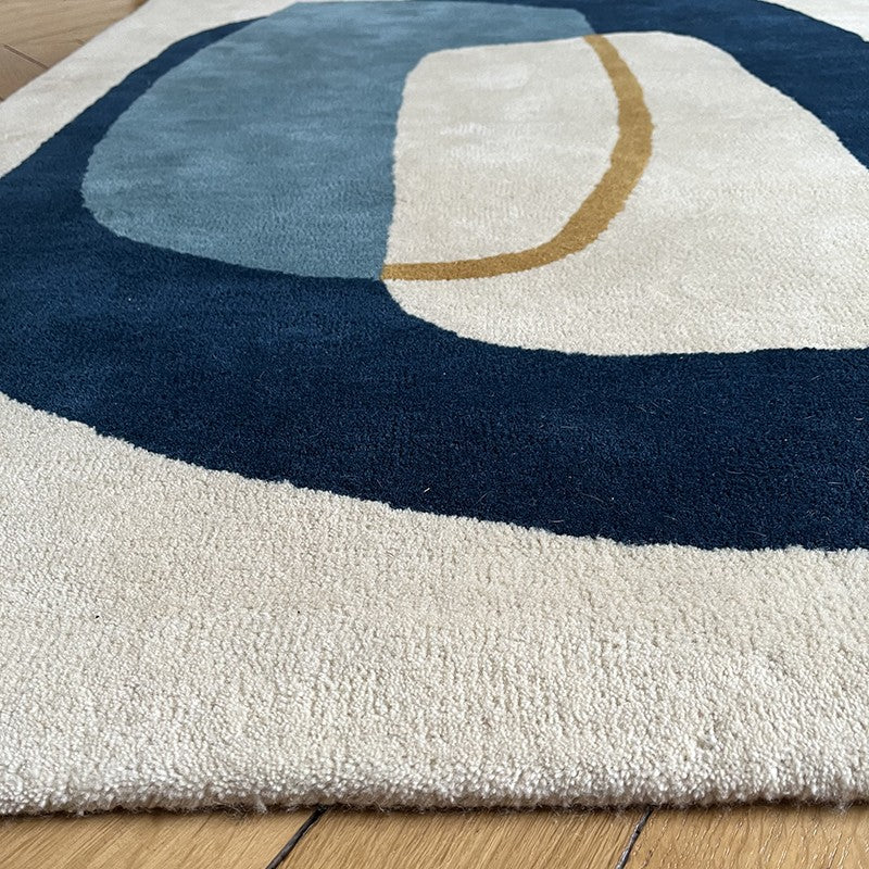 Tapis bleu orage Inclusion