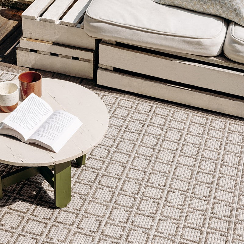 Tapis extérieur beige effet cannage
