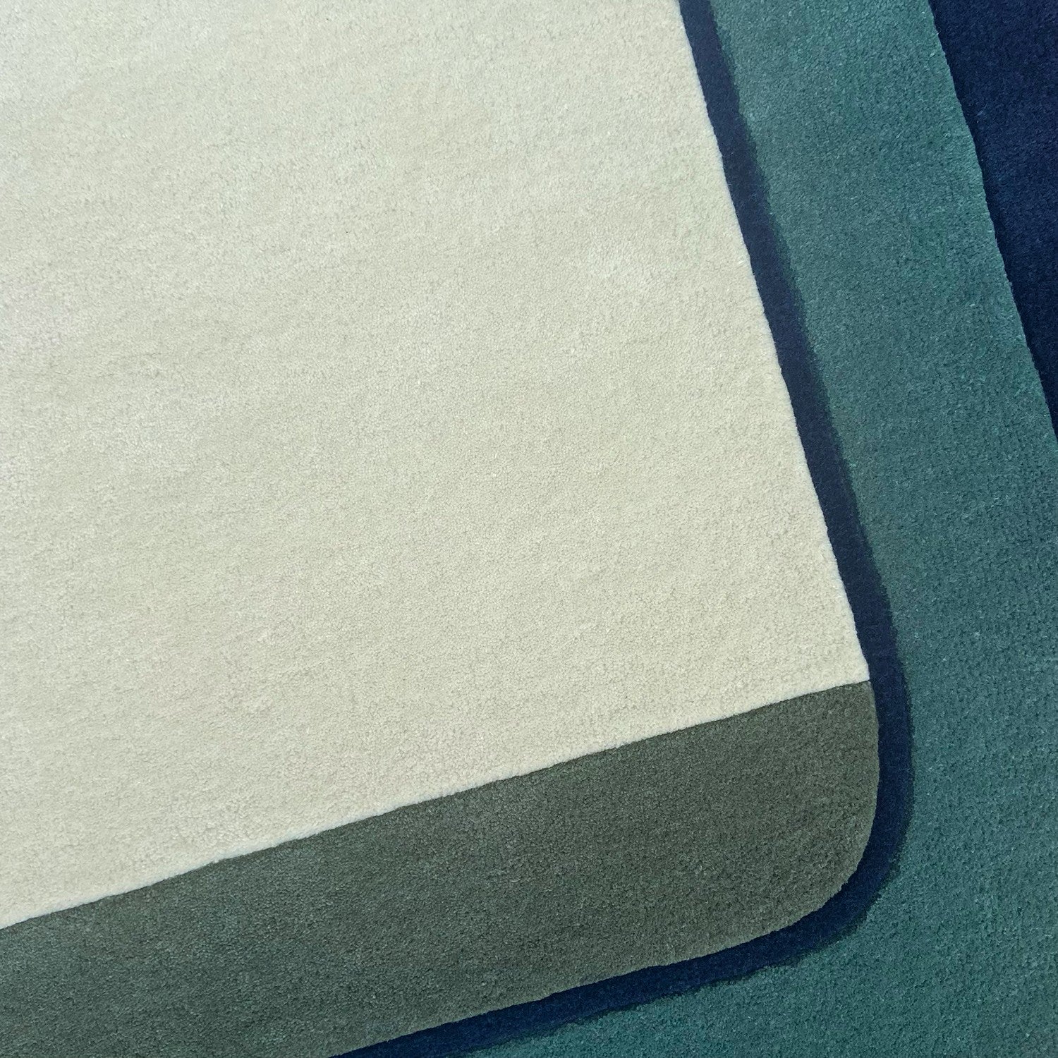Zoom texture tapis bleu en laine