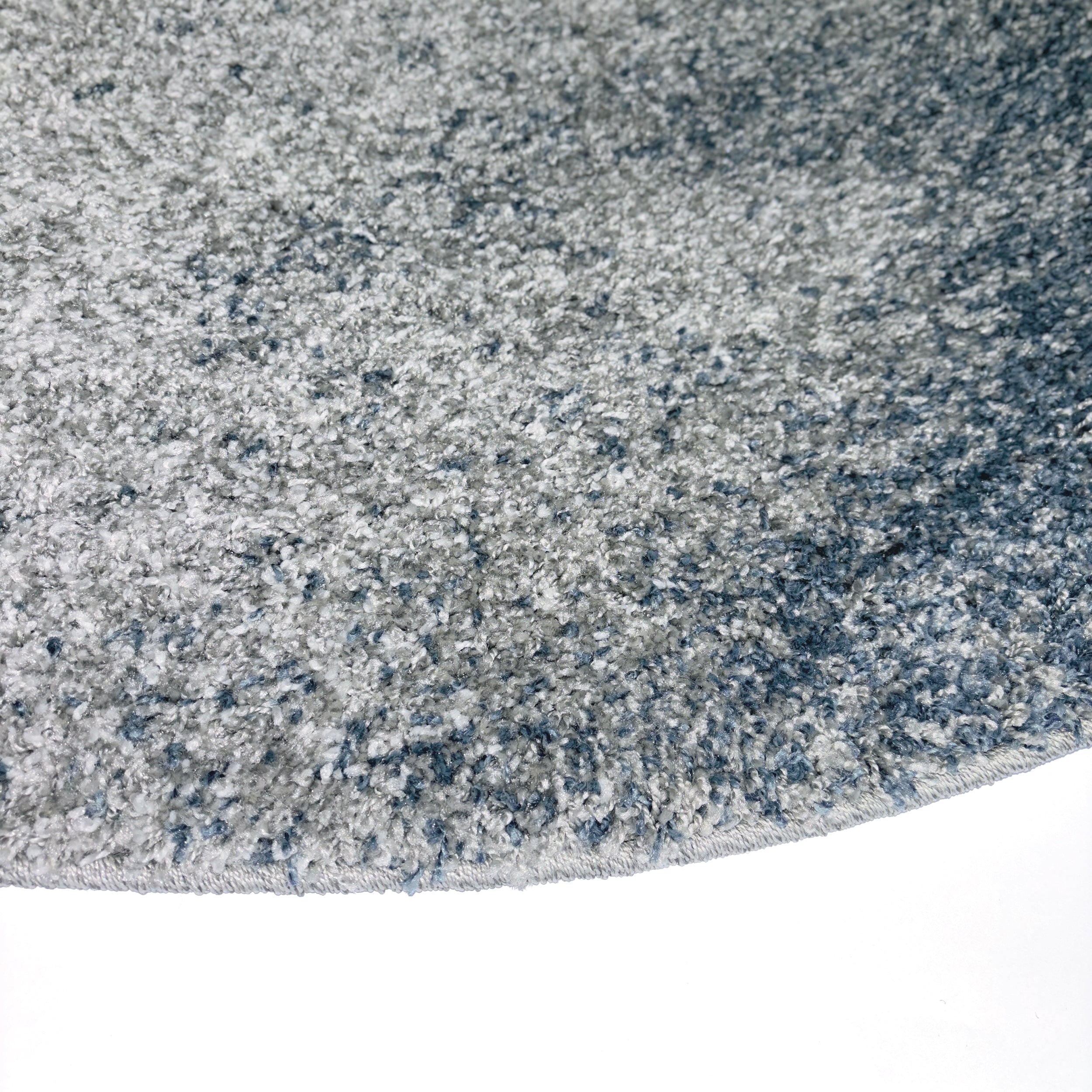 Zoom tapis bleu et gris