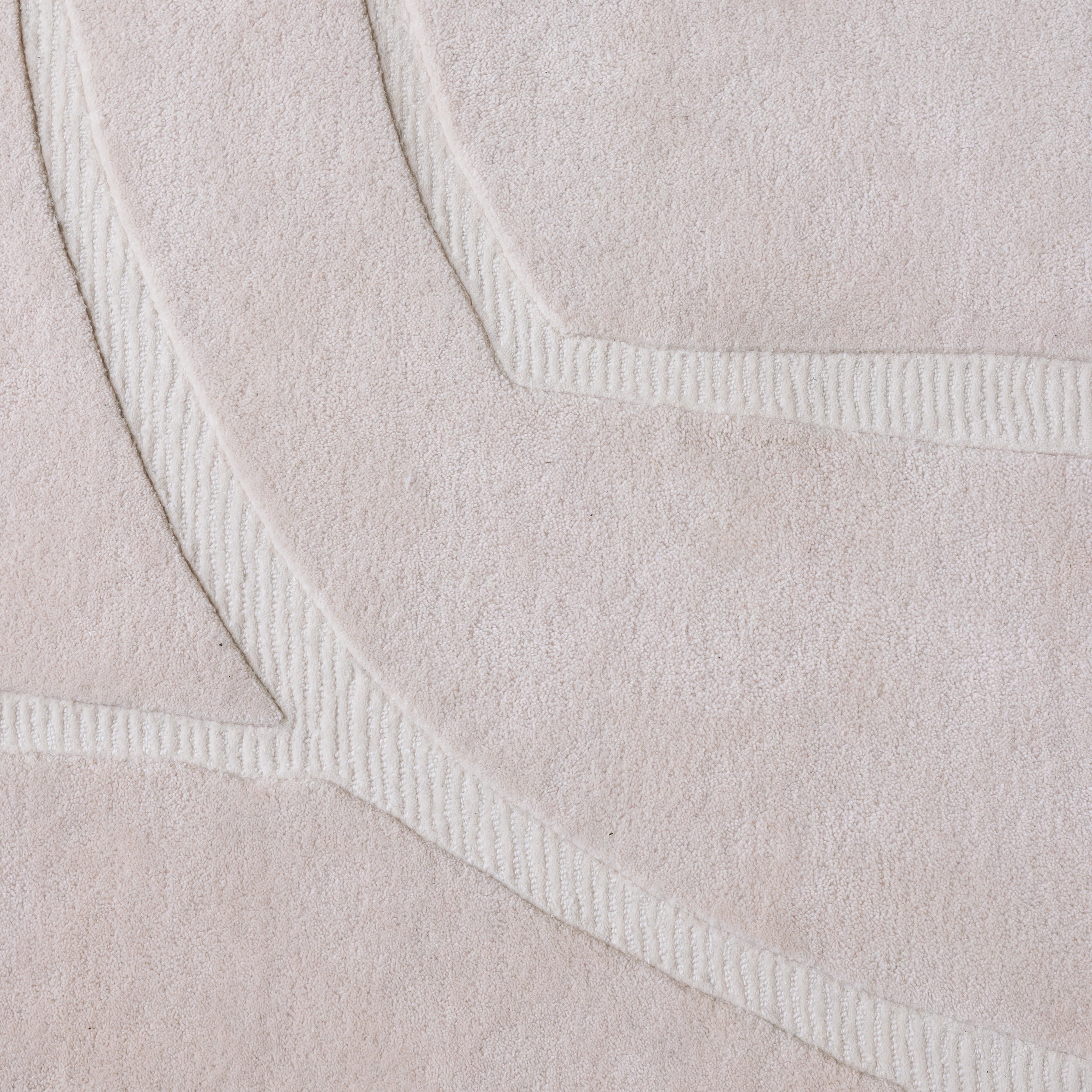 Zoom texture tapis en laine blanc