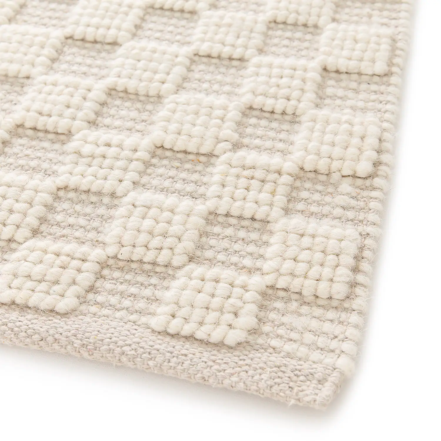Zoom tapis laine damier motif en relief
