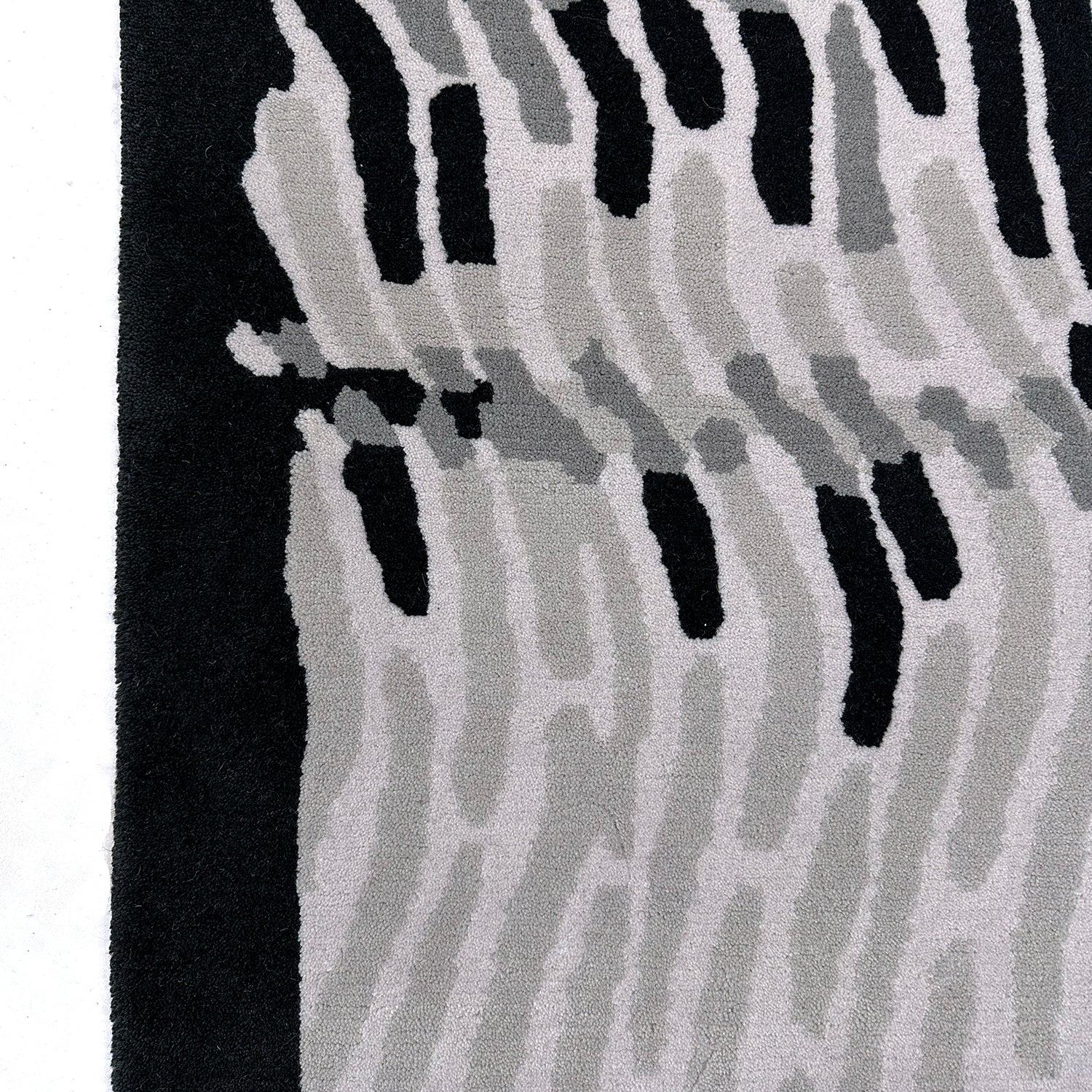 Tapis noir et gris Ether