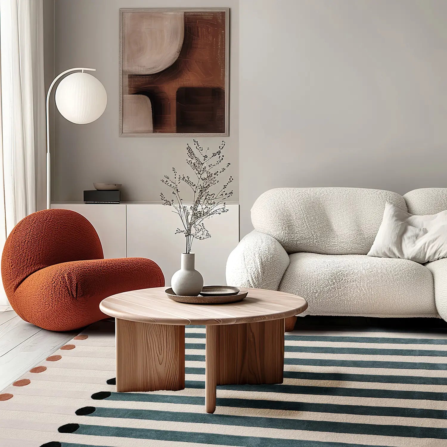 Tapis de salon en laine multicolore canapé blanc et fauteuil Pacha