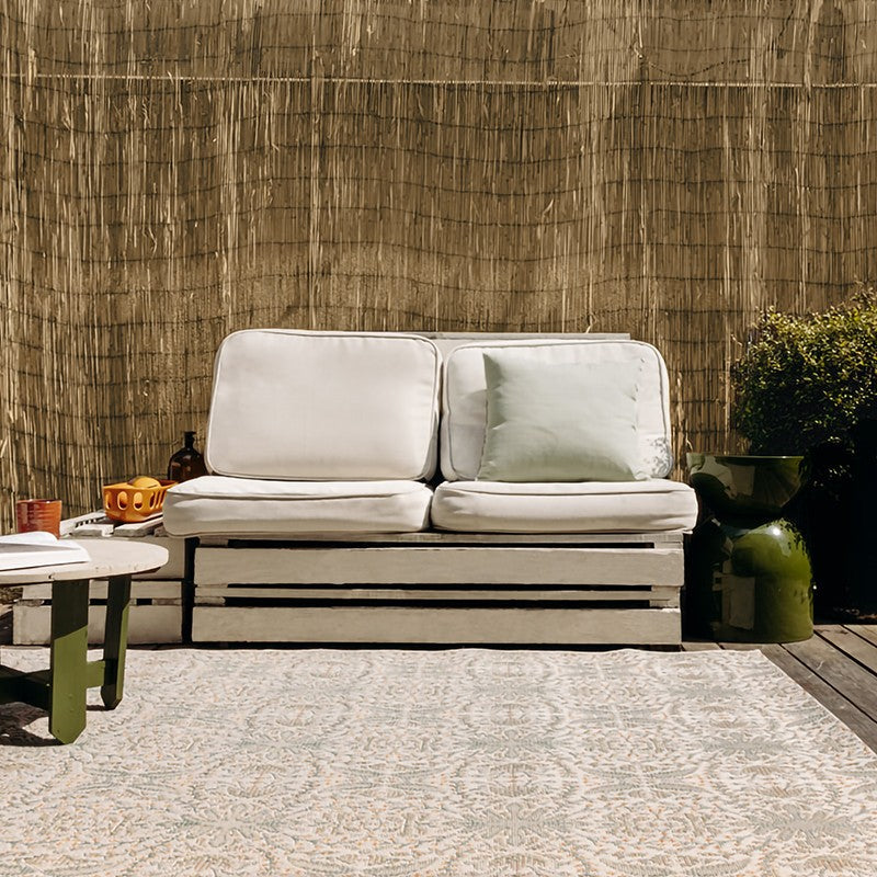 Tapis extérieur beige, orange, vert aux motifs floraux