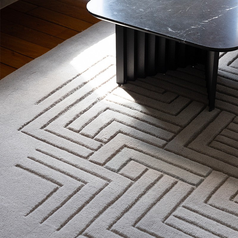 Zoom texture tapis en laine gris
