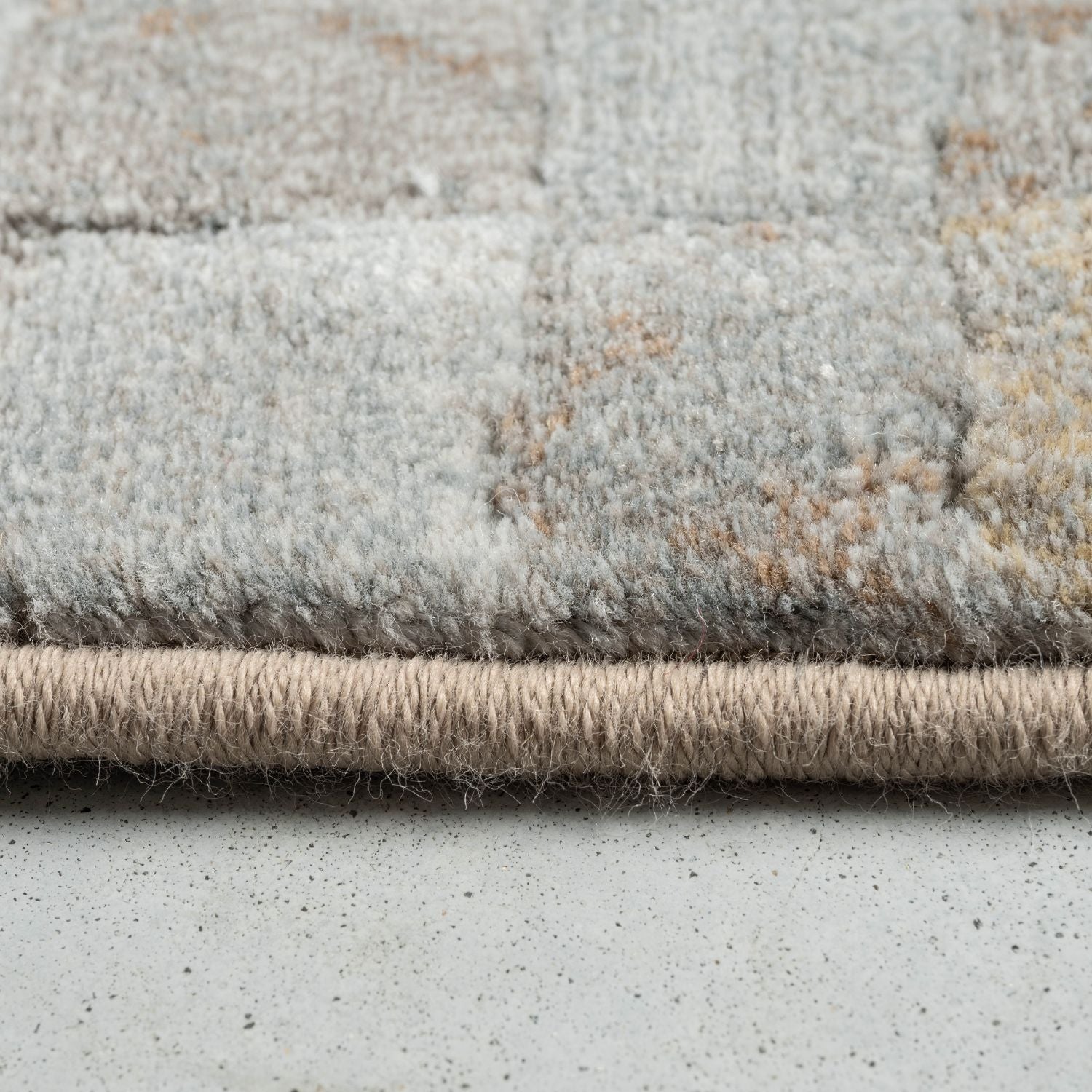 Tapis beige/gris cube