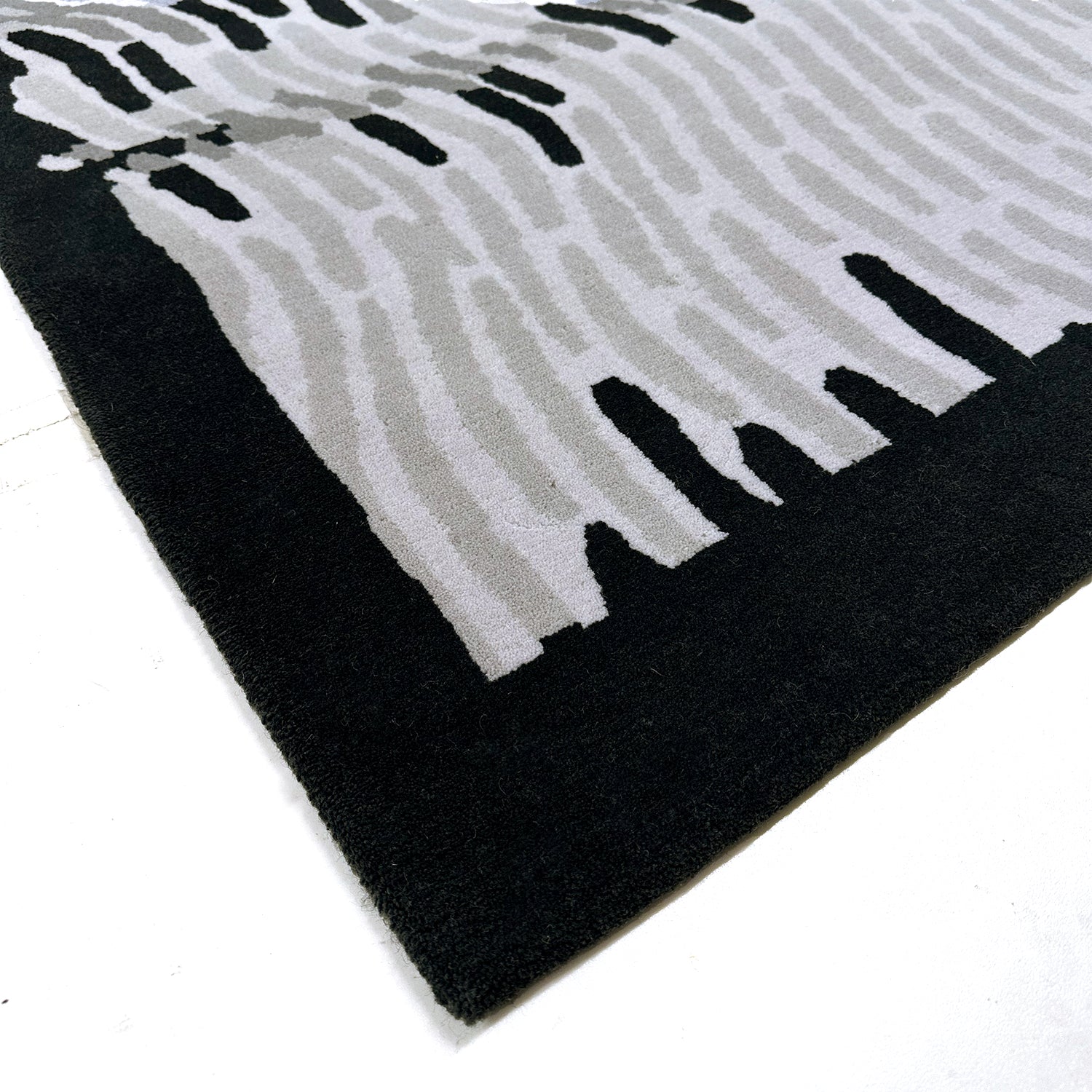 Tapis noir et gris Ether